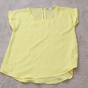 Sheer pale yellow blouse